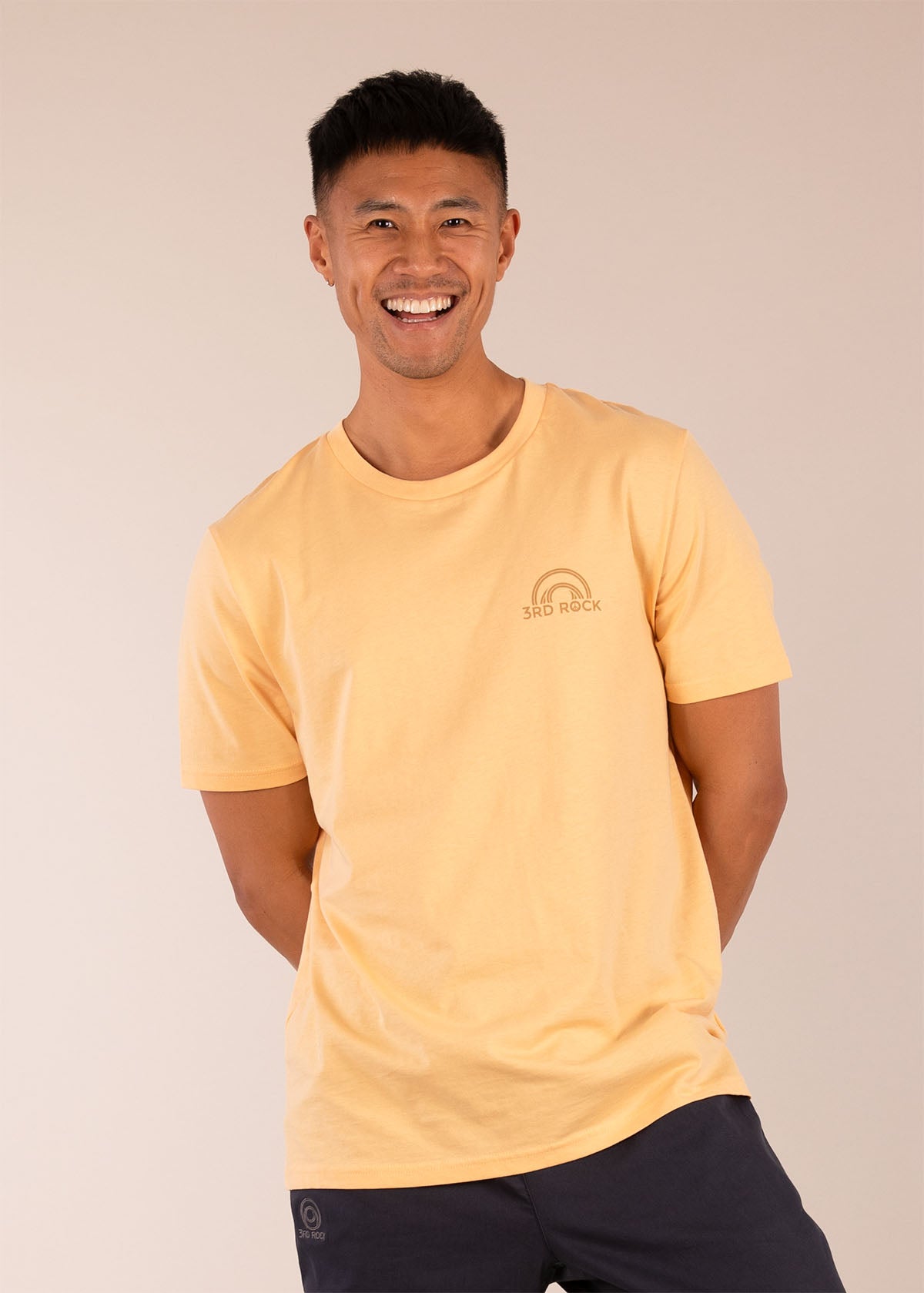 3RD ROCK Clothing organic cotton tee with horizon logo in our egg custard colour - Donald is 6ft1″  with a 40" chest and is wearing a size L. M